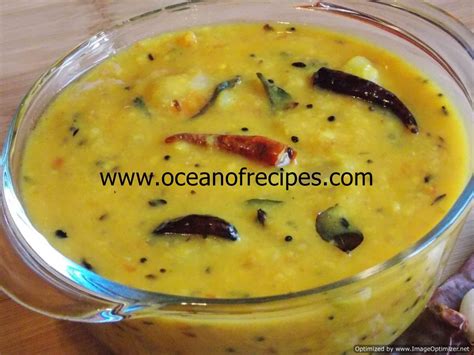 The outer skin is smooth and bright white with one bulbous end that tapers slightly to a green calyx. Dosakaya pappu (yellow cucumber dal) | Yellow cucumber ...