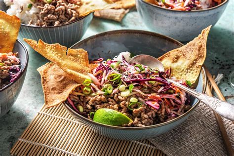 Tender marinated pork wrapped up with crisp garden vegetables and topped with a spicy sriracha sauce. Pork Spring Roll Bowl with Crispy Wontons | Recipe | Pork ...