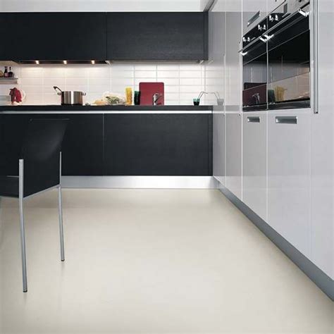 We chose a wider plank that. Taking care of your vinyl flooring | Kitchen flooring, White kitchen floor, Vinyl flooring
