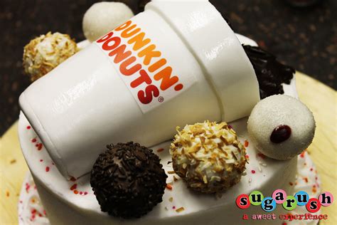 It S A Cake Dunkin Donuts Cake With Munchkin Cake Pops Dunkin Donuts Cake Dunkin