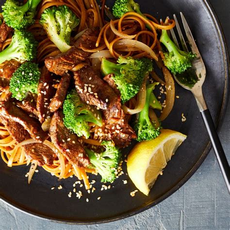 This is a treasure trove of healthy low carb recipes. Sesame-Garlic Beef & Broccoli with Whole-Wheat Noodles Recipe - EatingWell