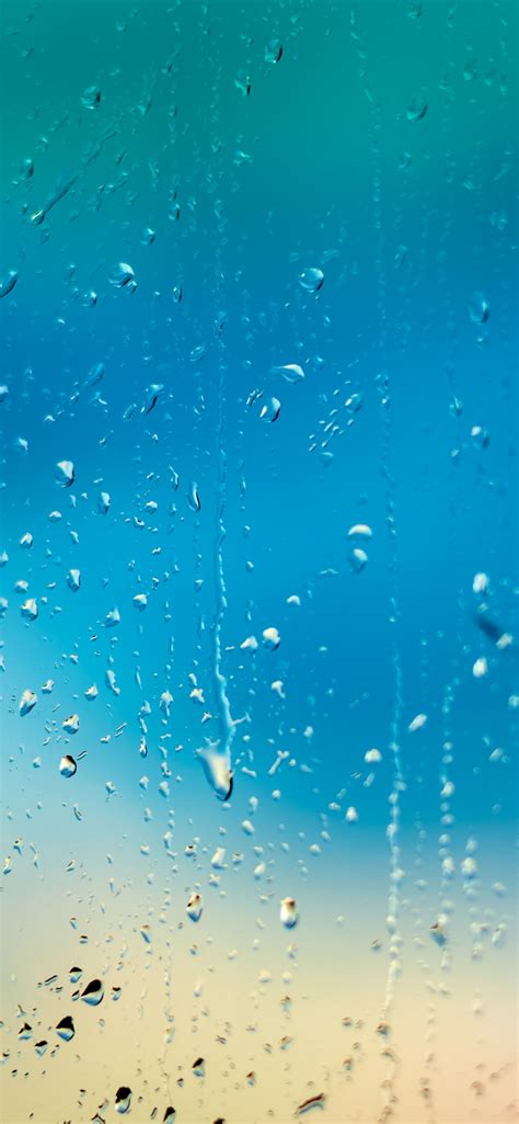 Water Droplets 4k Wallpaper Glassy Blue Background Closeup