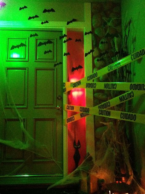 Caution Tape And Bats On The Door For Halloween Spooky Diy Halloween