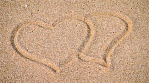 Two Hearts In The Sand On The Beach Stock Photo Image Of Honeymoon