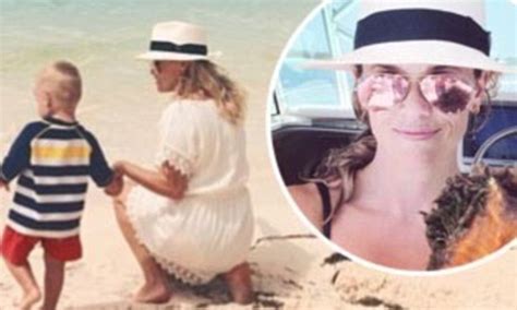 Reese Witherspoon Holds Son Tennessee S Hand As They Relax On The Beach Daily Mail Online