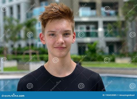 Young Handsome Teenage Boy With Blond Hair Outdoors Stock Image Image