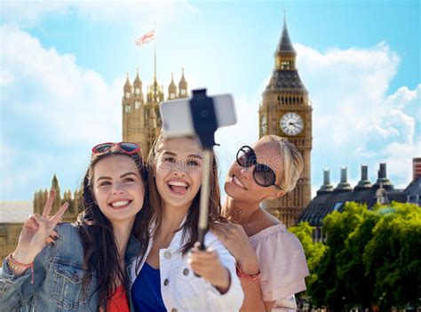 Group Of Smiling Women Taking Selfie In London Stock Image Image Of