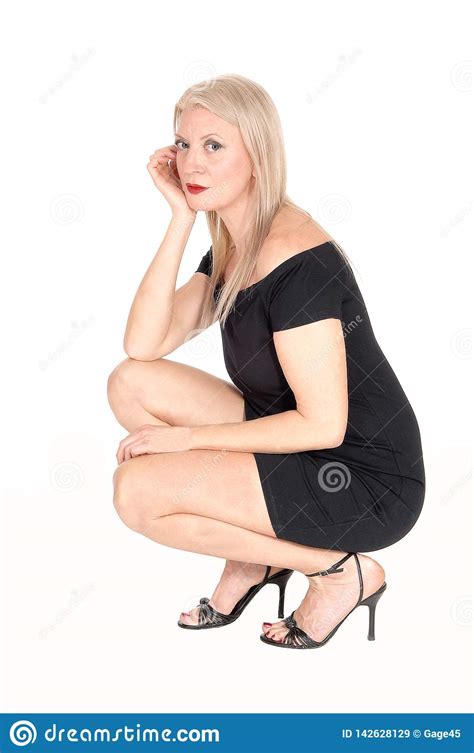 Gorgeous Blond Woman Crouching On Floor Stock Image Image Of Full