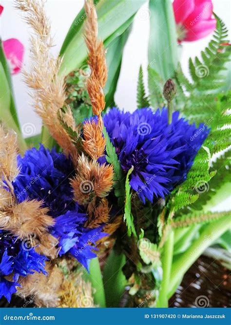 Bouquet Of Cornflowers And Tulips Close Up Stock Photo Image Of Blue