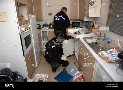 Police Officers Search A House For Drugs In Hull Police Drugs Raid On