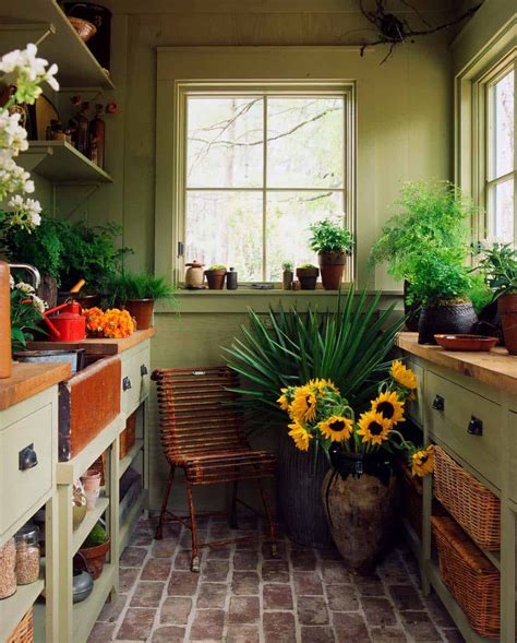 A Kitchen With Sunflowers And Potted Plants