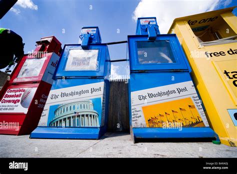 Newspaper Vending Machines On The Sidewalk Selling The Washington Post And The Washington Times