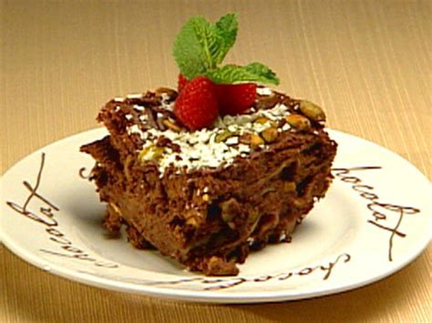 This ooey gooey chocolate lasagna with layers of chocolate cake, caramel, and cream cheese will definitely wow your friends! Chocolate Dessert Lasagna Recipe | George Duran | Food Network