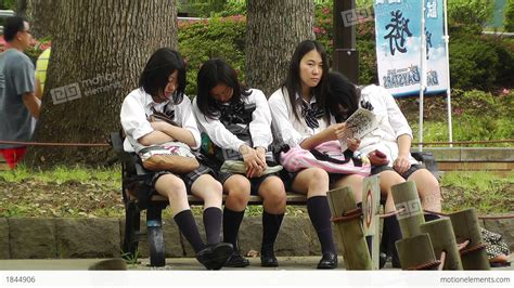 Japanese Schoolgirls Relaxing In Park In Yokohama Japan 11 Stock Video Footage 1844906