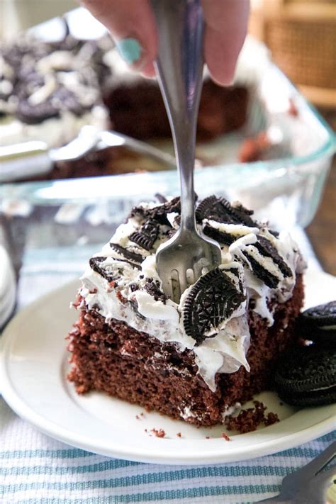 Oreo poke cake is an oreo lovers dream, full of chocolate, crushed cookies, whipped cream and pudding. Oreo Poke Cake - From a Box Cake Mix! - All Things Mamma