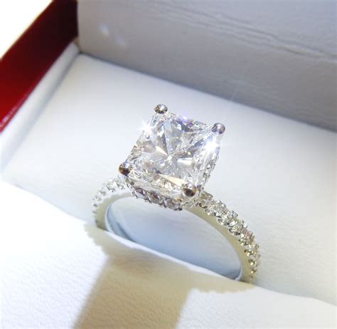 The width tapers from 5.2mm at the top down to 3mm at the bottom. Radiant Cut Diamond Engagement Ring - DiamondNet