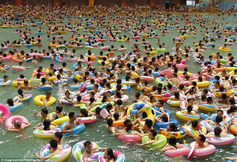 Chinese Tourists Cram Chinas Biggest Pool Named The Dead Sea On Hot