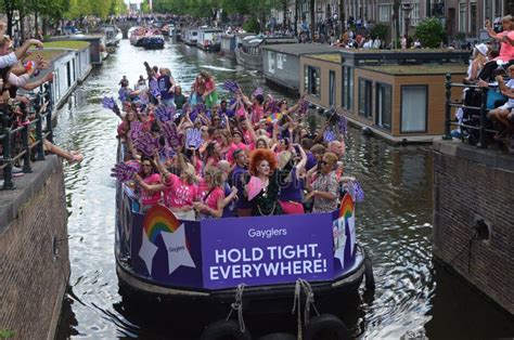 amsterdam netherlands august 06 2022 many people in boats at lgbt pride parade editorial