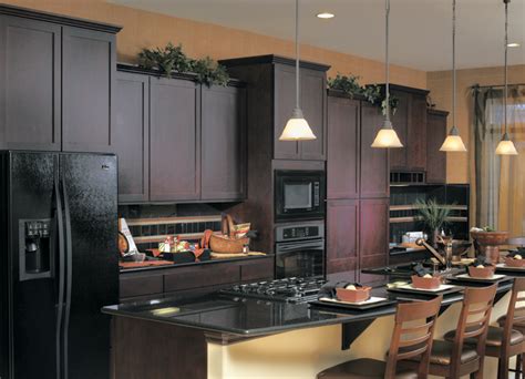 The white painted fireplace surround coordinates with. Kitchen Cabinet Colors with Black Appliances - Decor ...