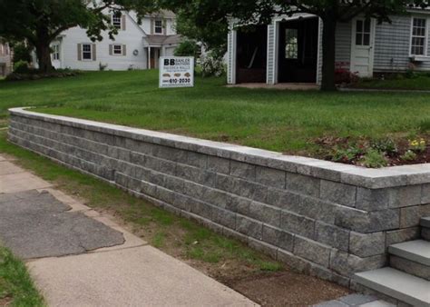 In most cases, the retaining wall will be built by first excavating a trench, followed by backfilling the area behind where the wall will be with gravel, and leveling the ground for the wall installation. How much do Retaining Walls Cost? | Landscaping retaining walls, Retaining wall cost, Retaining wall