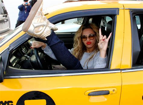Beyonce Drives Yellow Cab And Teases Big Announcement E Online