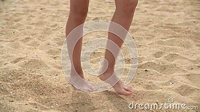 Female Barefoot Feet Walking On Sand On Summer Beach Close Up Barefoot