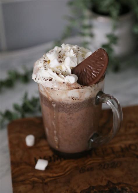 baileys hot chocolate recipe with orange and lots of whipped cream