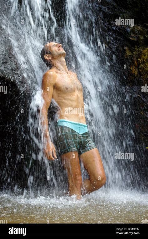Man Bathing Under Waterfall Hi Res Stock Photography And Images Alamy