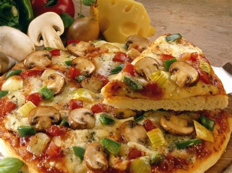 American Pizza With Mushrooms Peppers And Onions Recipe Eatsmarter