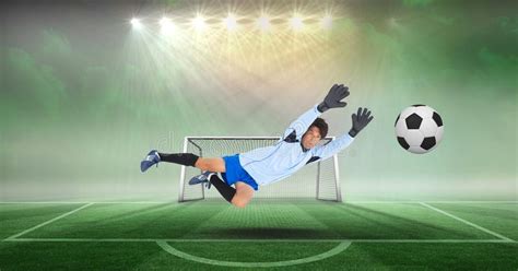 Composite Images Of Soccer Goalkeeper With Ball On Soccer Field Stock