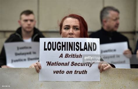 Loughinisland Victim Protestors Stand With Placards And Banners News