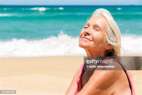 older woman sunbathing photos and premium high res pictures getty images