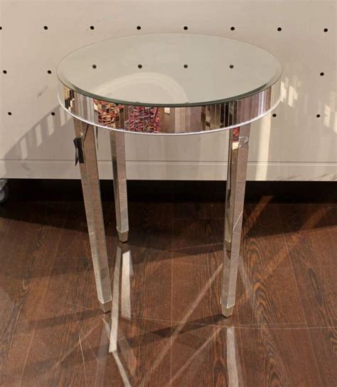 Lot A Ching And Co Mirror Glass Circular Top Table 24 X 27 1 2 In 61 X 70 Cm