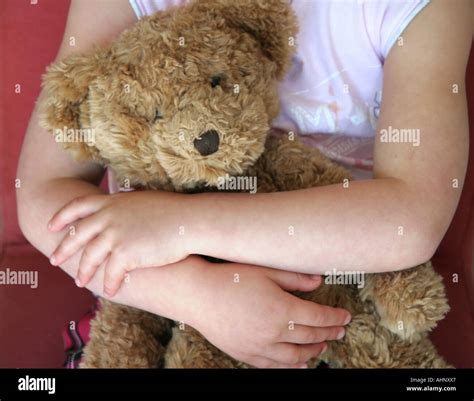Young Girl Holding Teddy Bear Stock Photo Alamy