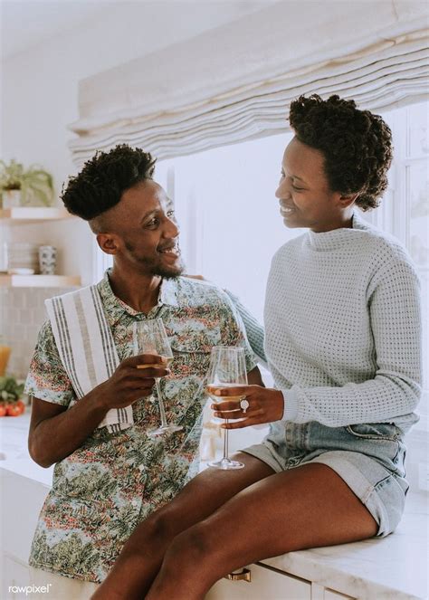 Download Premium Image Of Happy Couple Enjoying A Glass Of Wine In The Cute Black Couples