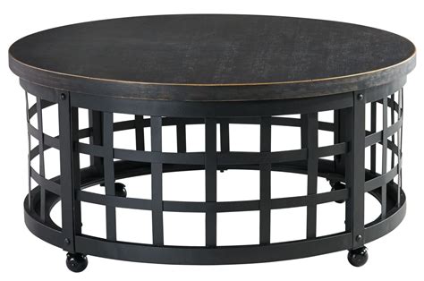 Perfect for resting refreshments or a centerpiece, cocktail tables are versatile workhorses for outdoor conversation areas. Marimon Round Cocktail Table from Ashley (T746-8) | Coleman Furniture