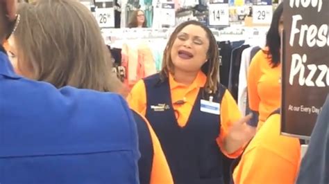 Walmart Cashier Stuns Shoppers Singing National Anthem After Son Gets