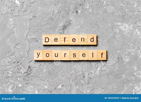 Defend Yourself Word Written On Wood Block Defend Yourself Text On