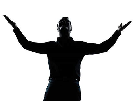 Silhouette Looking Up Men Arms Outstretched Pictures Images And Stock