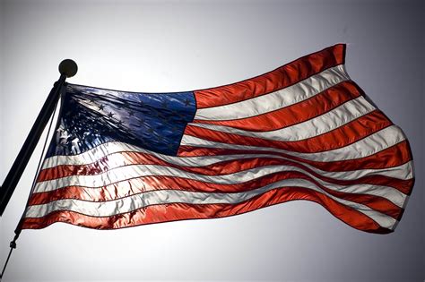 File:US Navy 060417-N-8157C-162 The American flag flies prominently