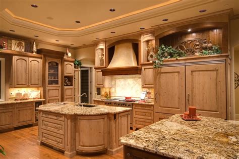 Large Luxury Kitchen With Two Kitchen Islands Tray Ceiling And Wood