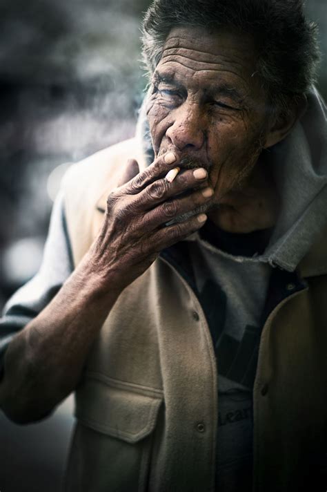 A Mean Man Smoking A Cigarette Outside The Cafe Smithsonian Photo Contest Smithsonian Magazine