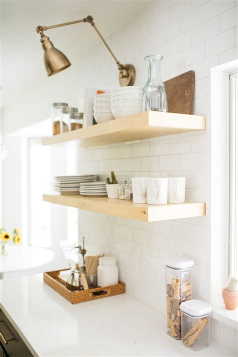 Brass sconces with open shelves. | Open kitchen shelves, Kitchen