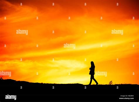 Woman Walking Away Silhouette Hi Res Stock Photography And Images Alamy