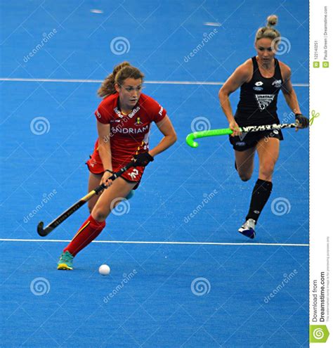 Player Dribbling And Looking Up On Field Hockey Pitch Editorial Photo