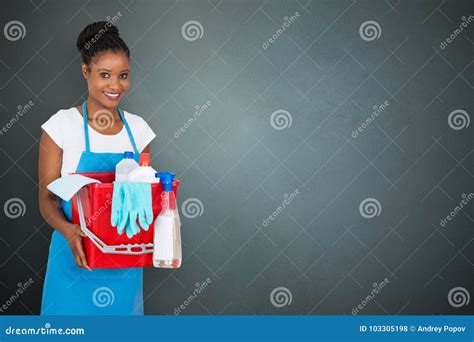 Female Janitor Holding Cleaning Equipment Stock Photo Image Of African Plastic