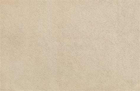 Beige Wall Stucco Texture In A Sunny Day As Background Stock Photo