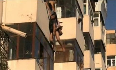 Man Catches Girlfriend During Suicide Jump In China Video Huffpost