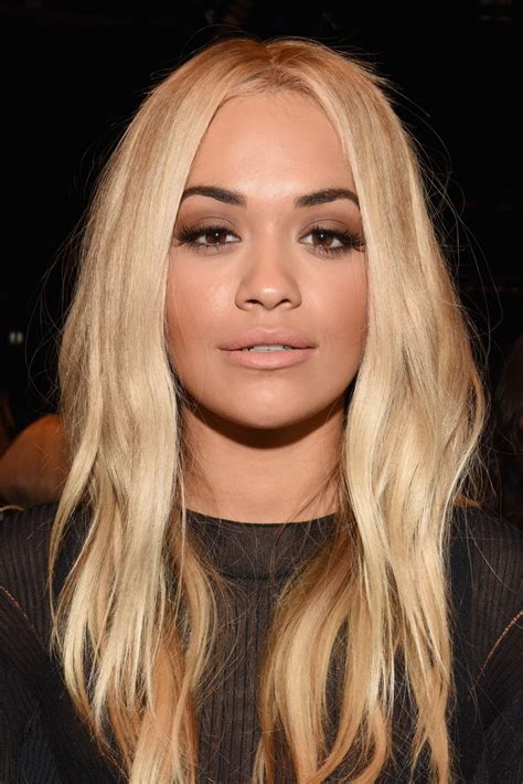 Rita ora goes high with the hair who says the top knot is just for the boys? Rita Ora Long Wavy Cut - Rita Ora Hair Looks - StyleBistro