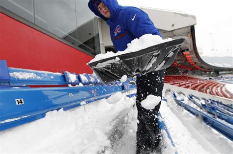 Watch Bills Fans Dig Their Seats Out From Under The Snow Ahead Of